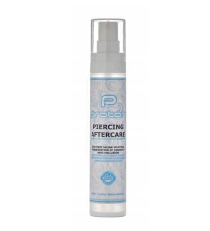 Un frasco transparente de Aftercare Piercing Proton, de NOBLE ART BEAUTY SOCIEDAD LIMITADA, con un dosificador blanco y una etiqueta azul y blanca, destaca su fórmula vegana e hipoalergénica, perfecta para el cuidado de los piercings de Noble Art o para los tratamientos posteriores al láser.