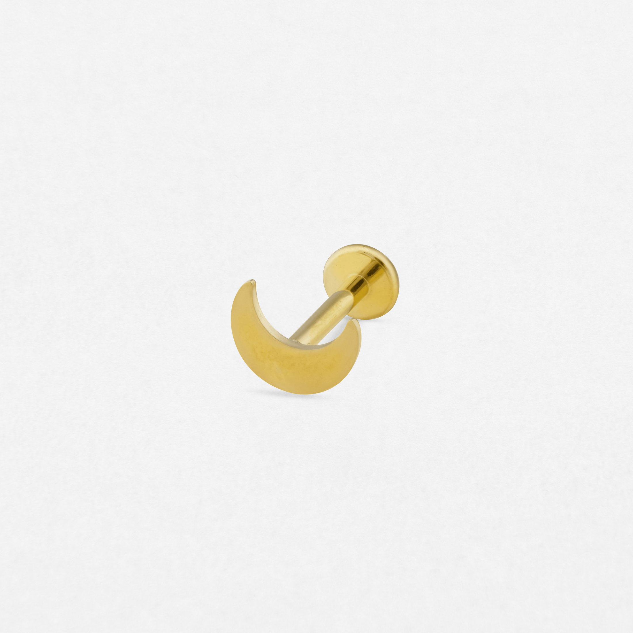 The «Eclipse» model by NOBLE ART BEAUTY SOCIEDAD LIMITADA is a small gold crescent moon hoop earring with a flat back, shown on a plain white background.
