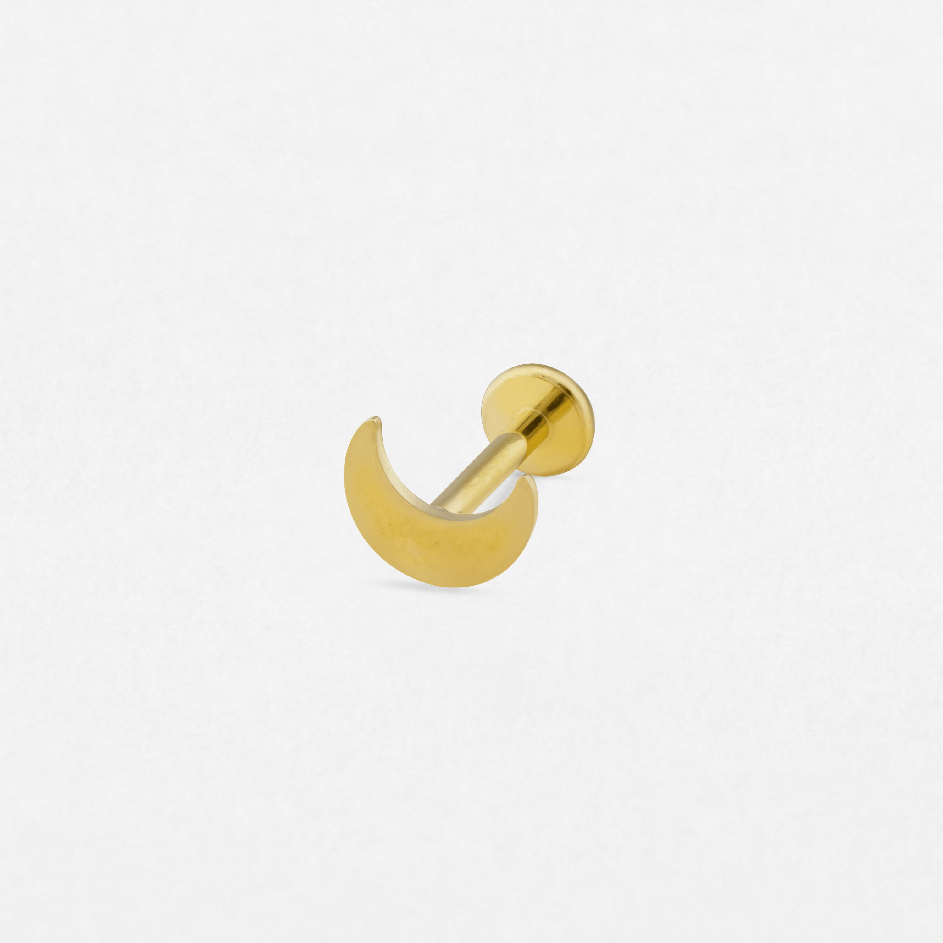 The «Eclipse» model by NOBLE ART BEAUTY SOCIEDAD LIMITADA is a small gold crescent moon hoop earring with a flat back, shown on a plain white background.
