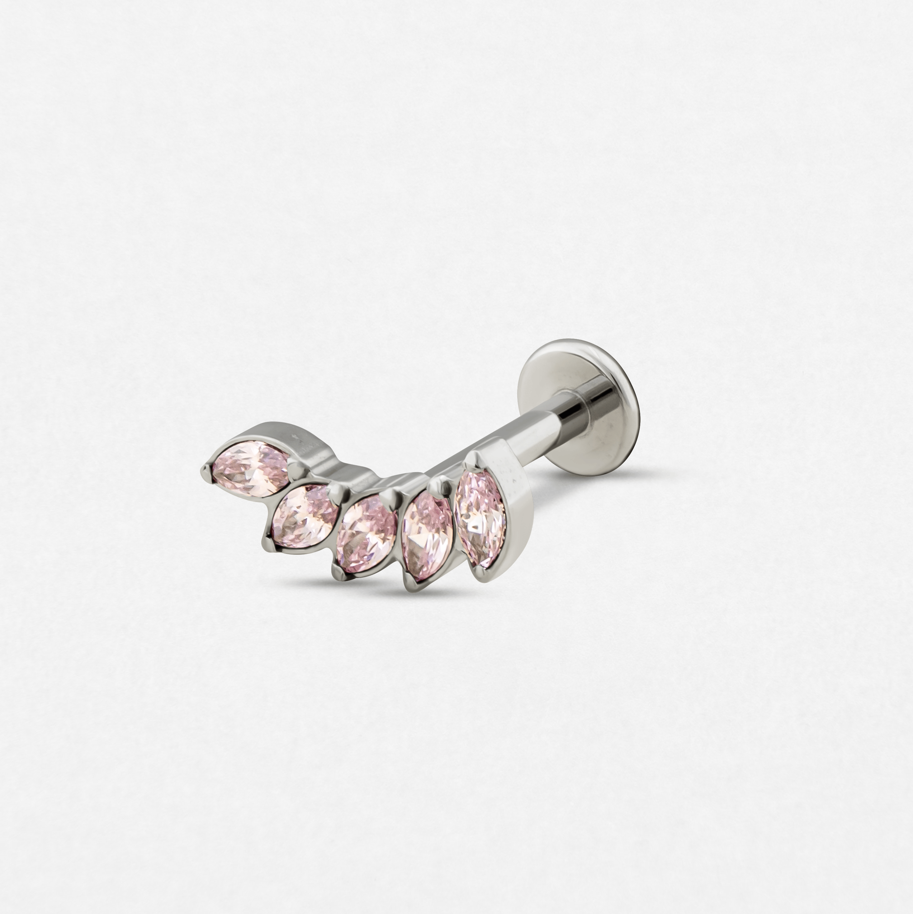 The «Gia rosa» model by Titanio-Noble Art is a silver bar earring with five pale pink marquise-cut precious stones arranged in a leaf shape, inspired by Noble Art tattoo designs, shown on a plain white background.